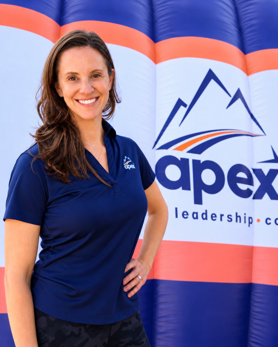 Kate Hanauer, owner of Apex Leadership Co. Upper Palmetto, in front of an Apex inflatable